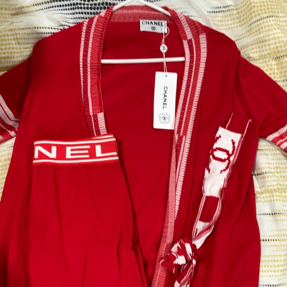 I have brand new Chanel cardi and skirt set (authentic)